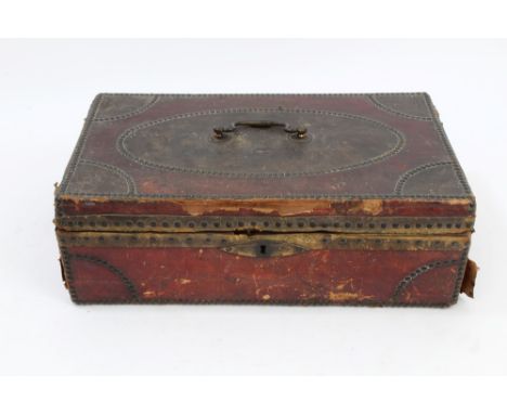 18th century red leather and close-stud travelling case with surmounting swan-neck carrying handles, the hinged top enclosing