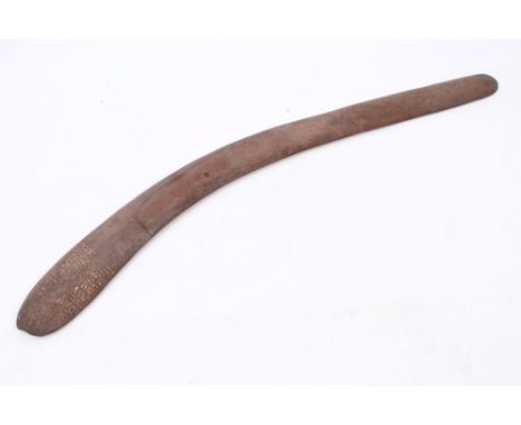 Good early Australian Aboriginal carved and painted boomerang - the broad terminal with dot ornament, 73cm long