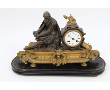 Late 19th century French bronzed and gilt metal mantel clock decorated with figure of Shakespeare on stool, white enamel dial