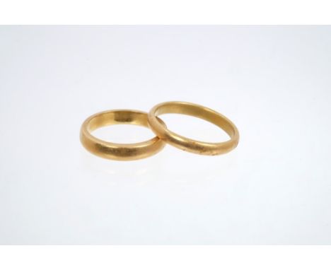 Gold (22ct) wedding ring (Birmingham 1922).  Ring size L½ and another (Birmingham 1928).  Ring size P½ CONDITION REPORT Total