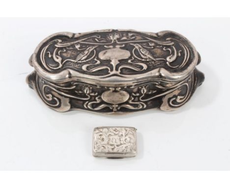 Edwardian silver trinket box of shaped rectangular form, with Art Nouveau-style birds and trailing floral decoration (Chester