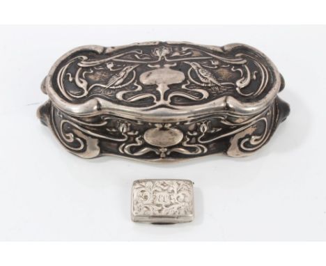 Edwardian silver trinket box of shaped rectangular form, with Art Nouveau-style birds and trailing floral decoration (Chester