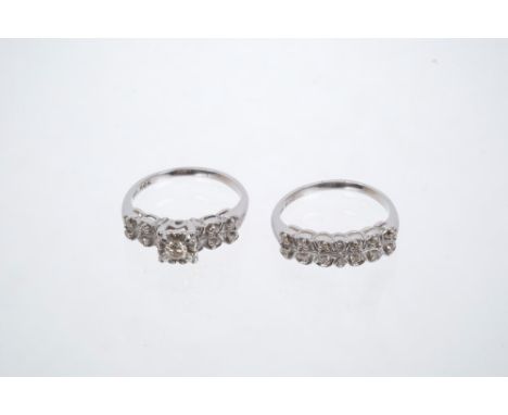 Diamond engagement ring and matching eternity ring, the engagement ring with a central brilliant cut diamond estimated to wei