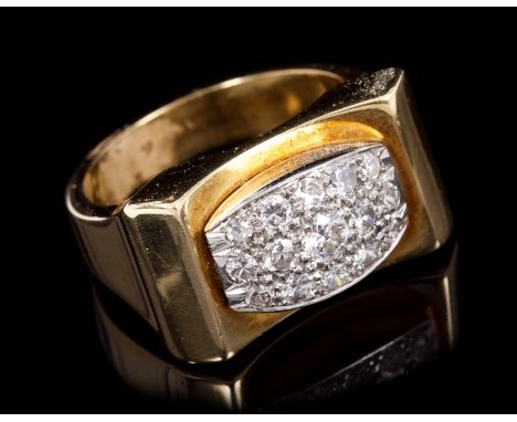 1940s / 1950s diamond dress ring of Odeonesque design, with a pavé set diamond bombe plaque, on polished gold sculptural beze