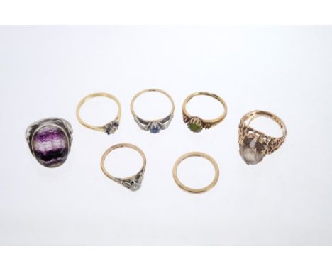 Group of eight rings - to include a diamond single stone ring, two sapphire and diamond rings, etc