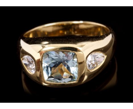 Bvlgari aquamarine and diamond three stone ring with a cushion cut aquamarine measuring approximately 6.9mm x 6.9mm x 4.1mm, 