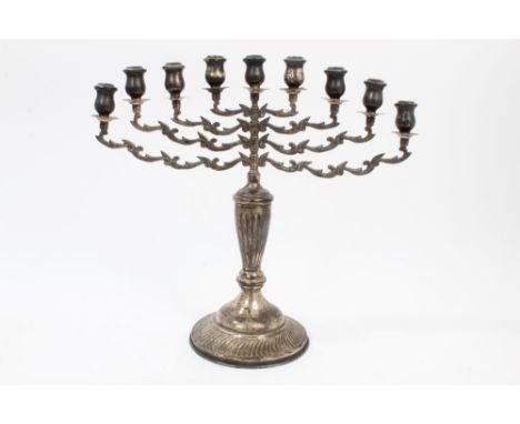 Judaica Interest:  1920s silver Hanukkah Menorah nine-light candelabrum with foliate branches and fluted urn-shaped stem on a