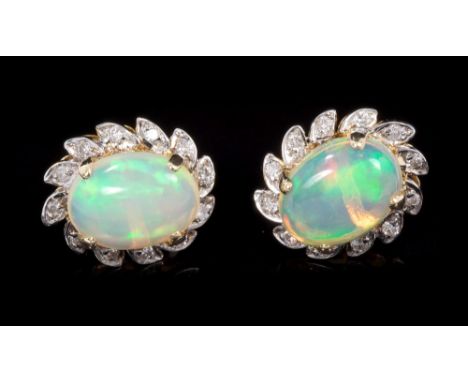 Pair opal and diamond earrings, each with an oval cabochon opal surrounded by brilliant cut diamonds, 14mm x 12mm