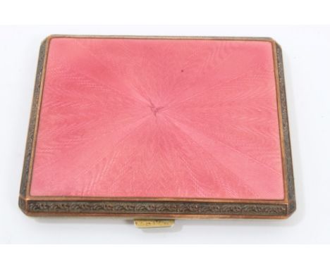 1920s gilt metal and pink enamelled cigarette case with engine-turned decoration, stamped inside gold case, 6.8cm across