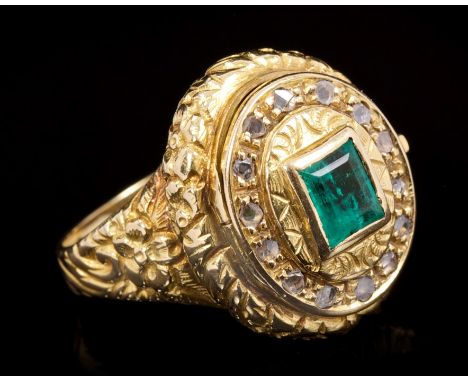 19th century-style emerald and diamond 'poison' ring with hidden compartment concealed by an oval bezel set with a step cut e