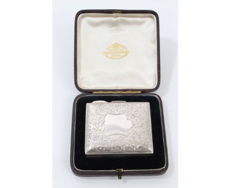 Edwardian silver four-compartment folding photograph wallet with engraved foliate decoration and vacant cartouche, with twin 