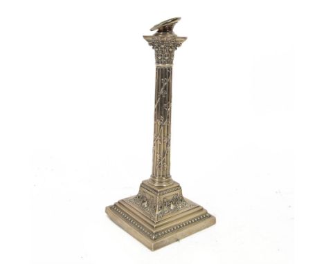 Edwardian silver Corinthian column candlestick, upon stepped square base, embossed throughout with vine leaf decoration, hall