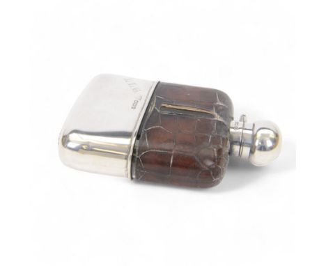 Edwardian silver mounted hip flask, the glass body overlaid with crocodile effect leather, with silver collar, cap and remova