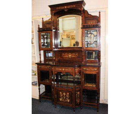 A Victorian inlaid rosewood sideboard with raised back consisting of central mirror, canopy, shelves and glazed cupboards, on