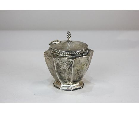 An Edward VII silver tea caddy, faceted form with circular lid, London 1903, 3.5oz, 9cm