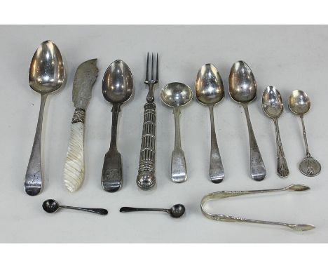 A collection of George III and later silver cutlery and servers, including a dessert spoon, three teaspoons, coffee spoon, fo