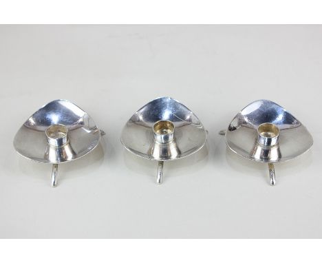 A set of three Danish silver candlesticks / tapersticks by Cohr, of triangular form on tripod base, marked Cohr Sterling Denm