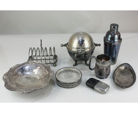 A silver plated revolving crumpet dish, a cocktail shaker, toast rack, pedestal dish, hip flask, bottle coaster, cup and dish