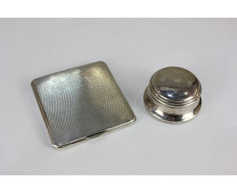 A George VI silver cigarette case, Birmingham 1940, and a modern silver paperweight, 6cm