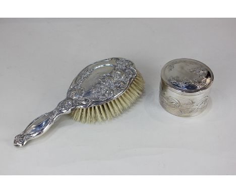 A George V Art Nouveau silver backed dressing table brush cast with flowers and scroll border, maker William Aitken, Birmingh