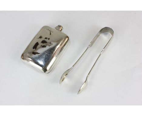 An Edward VII silver hip flask (lid missing), and a pair of silver plated sugar tongs