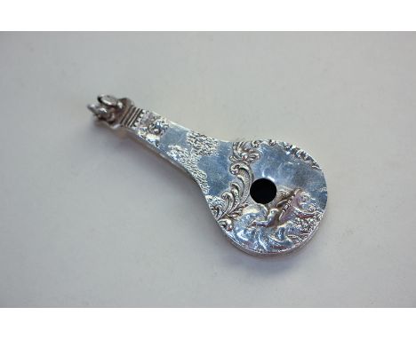 A Victorian Dutch silver model of a mandolin, import marks for David Bridge, London 1896, also stamped 930, with embossed des