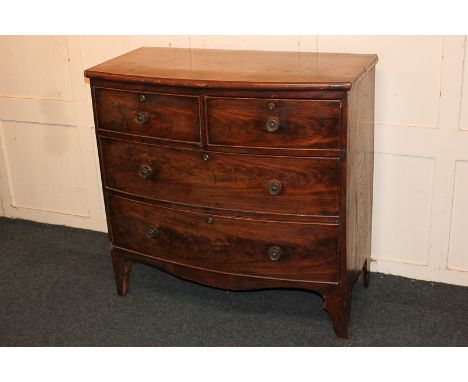 A George III mahogany bowfront chest of two short over two long drawers with brass knob handles, on bracket feet (a/f), 93cm