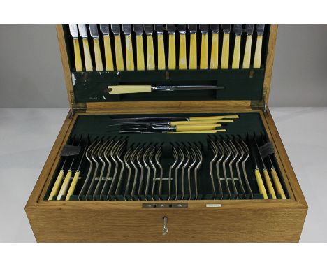 A George V silver Hanoverian pattern part canteen for twelve (one dessert fork missing) maker Roberts & Belk Ltd, Sheffield, 