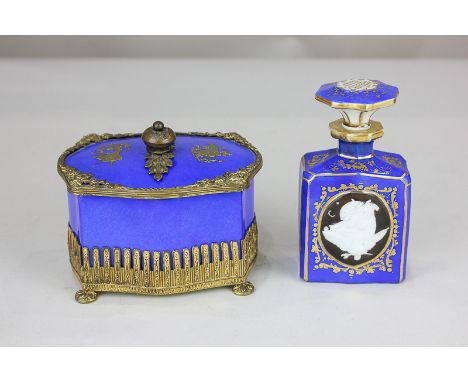 A 19th century porcelain scent bottle with central cameo in blue and gilt ground, together with a porcelain trinket box of sc