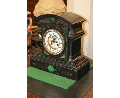 A Victorian slate mantel clock with gilt metal and enamel dial, marked Glading, Brighton, in architectural case, on plinth ba
