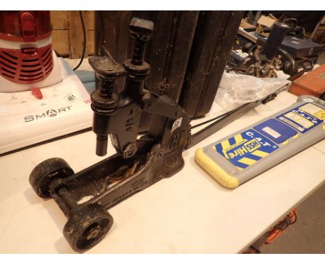 Portable vintage garage jack by Harvey Frost 