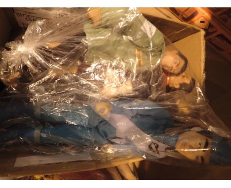 Four various Action Man dolls and figurines and a Thunderbirds doll