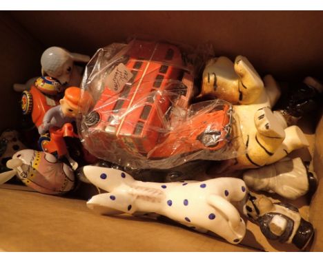 Box containing wind up toys model cars ceramic figurines etc