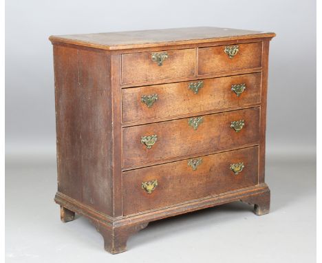 A George III provincial oak chest of elm-lined drawers, on bracket feet, height 94cm, width 98cm, depth 54cm.Buyer’s Premium 