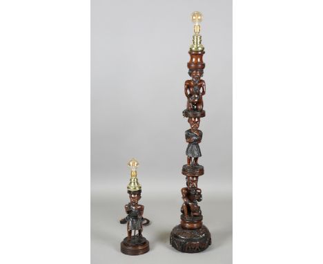 A 20th century African hardwood figural totem lamp standard, height 160cm, together with a matching table lamp, height 63cm.B