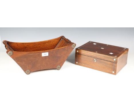 A 19th century mahogany cheese coaster of typical boat form, width 40.5cm, a 19th century rosewood and kingwood banded writin