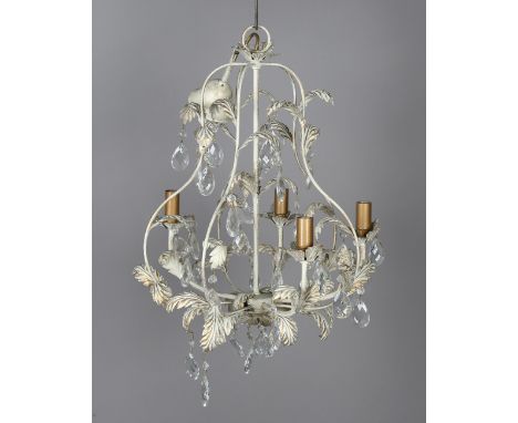A late 20th century painted and gilt toleware four-light chandelier, hung with clear glass drops, height 55cm, width 40cm.Buy