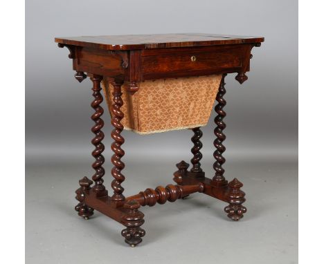 A mid-Victorian rosewood games table, the removable sliding top inlaid to one side with a chessboard and revealing an inset l