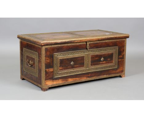 A 20th century Middle Eastern hardwood and brass mounted trunk, height 41cm, width 92cm, depth 46cm.Buyer’s Premium 29.4% (in