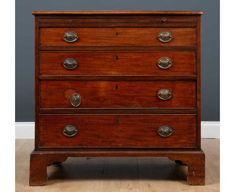 A George III mahogany small sized chest with brushing slide over four graduated drawers, all on bracket feet, 86cm wide x 47c