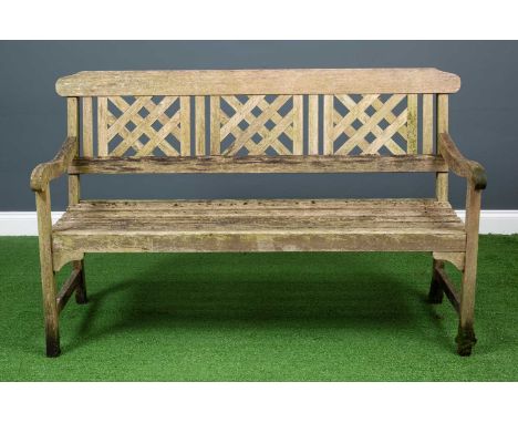 A modern wooden three seater garden bench, the seat back designed with three decorative panels,138.5cm wide x 48cm deepCondit