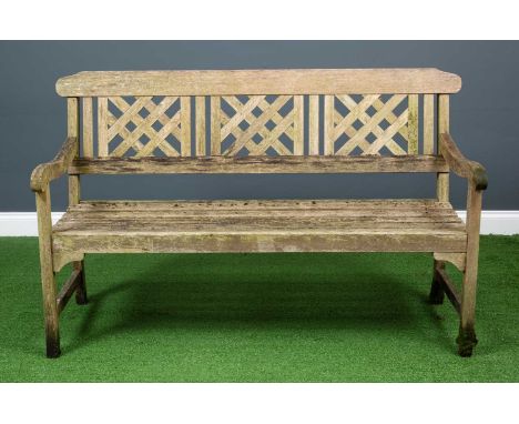 A modern wooden three seater garden bench, the seat back designed with three decorative panels,138.5cm wide x 48cm deepCondit