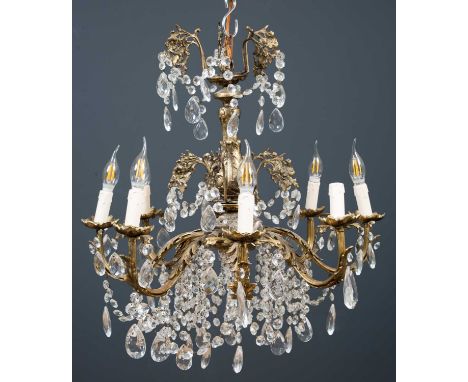 A hanging eight light electrolier or chandelier with acanthus leaf moulded branches and cut glass drops, 63cm wide x 66cm hig