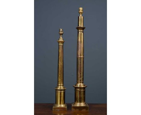 A lacquered brass column table lamp with turned column on a square base, 11cm wide x 67cm high to the fitting together with a