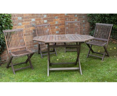 A Kent teak folding garden table and four chairs in good condition with some minor marks and wear due to useCondition report: