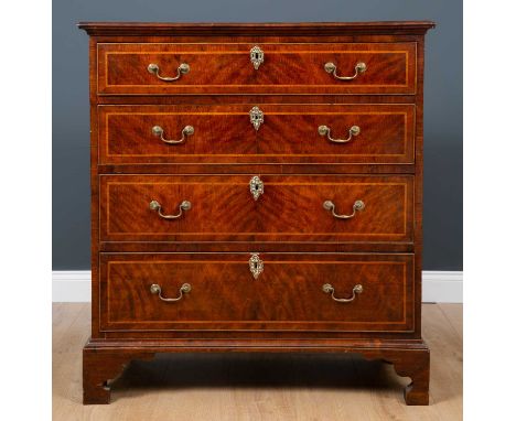 A yew wood inlaid chest of four graduated drawers on carved bracket feet, 91cm wide x 43cm deep x 104cm highCondition report: