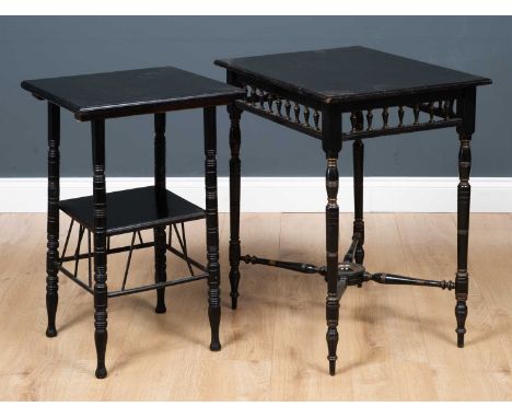 A Victorian ebonised aesthetic two tier occasional table with ring turned legs, the undertier above stretchers, complete with