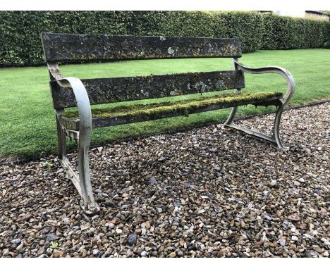 An old garden bench with painted cast iron ends and hardwood slats, 151cm wide x 66cm deep x 79cm highQty: 1Condition report: