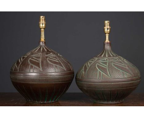 A pair of stylised bird decorated ceramic table lamps of ovoid form, 26cm diameter x 35cm high to the fittingCondition report