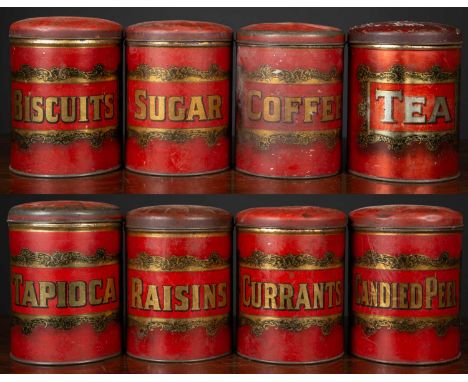 A set of eight 19th century storage tins, red enamelled with bold gold label within scrolling frame reading, TEA, COFFEE, BIS